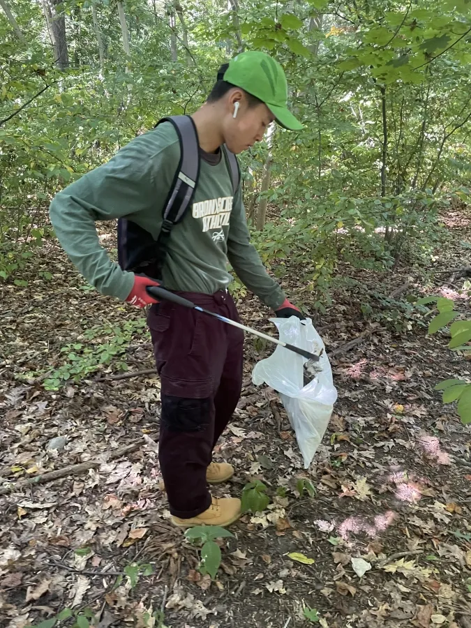 Jeffrey Yang, Bronx Science, at a park cleanup in 2021.